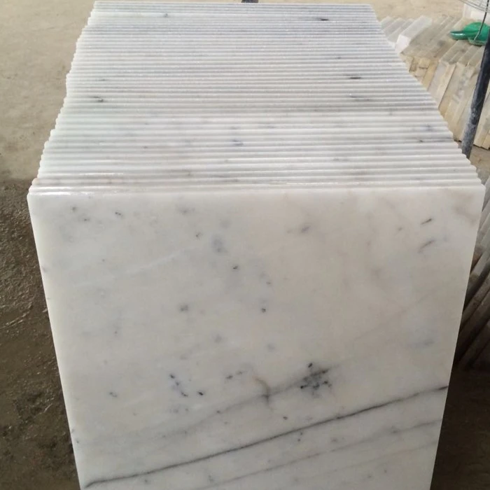 white marble tiles 600x600